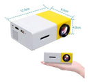 Proyector mini portatil YG300